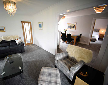 Tigh Beag Na Mara Living Room Open Plan with WIFI Sea Views and Woodburning Stove